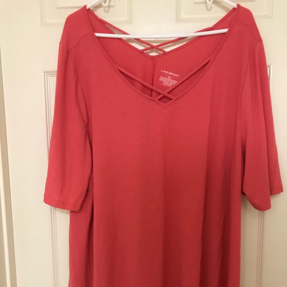 Cute cris-cross peach shirt